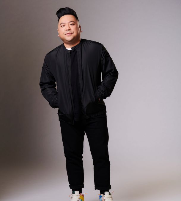 Full body portrait of Andrew Phung.